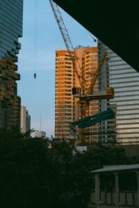 “Vancouver skyline with active housing construction cranes in June 2025”