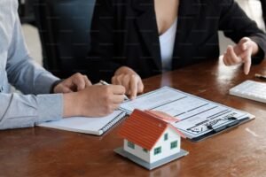 Canadian homeowner holding two mortgage term sheets labeled 3-Year and 5-Year fixed rates